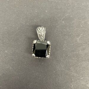 Black onyx pendant, set in sterling silver.